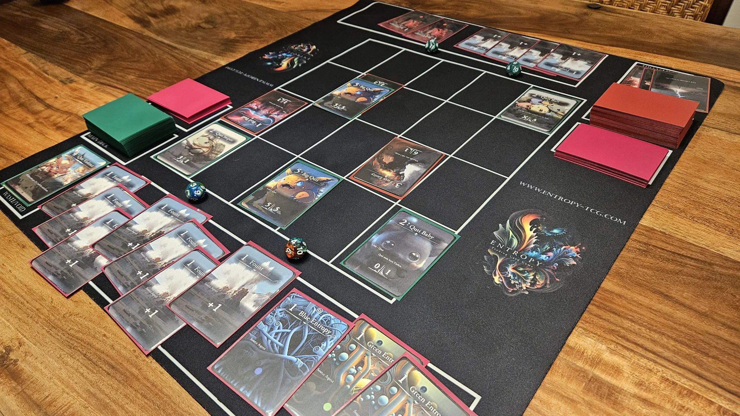 An Entropy TCG game in progress on a playmat